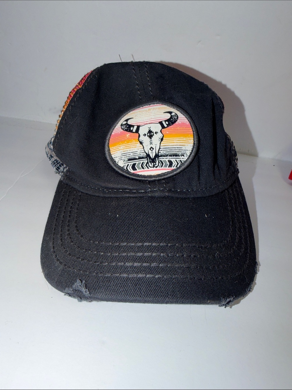 Cruel Girl Black Trucker Hat with Sunset Bull Skull Patch